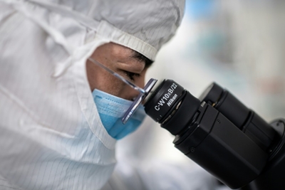 Equities, crude surge in Asia on hopes for virus treatment