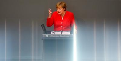 Merkel warns Trump against trade war