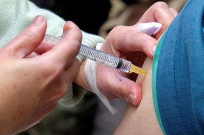 Taiwan leader accuses China of hindering vaccine deal