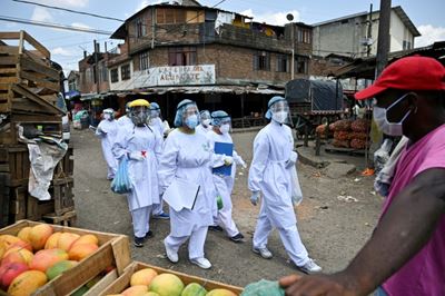 WHO to review virus response as Trump renews attack