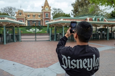 Disneyland in California delays reopening as virus cases rise