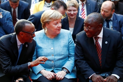 Merkel urges companies to switch focus from Asia to Africa