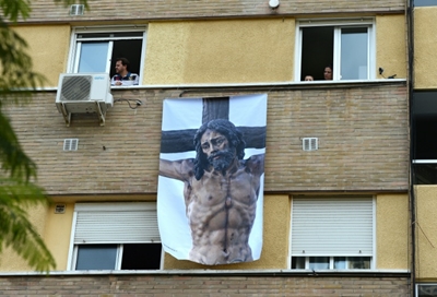 Locked-down Spain celebrates Holy Week with music and humour