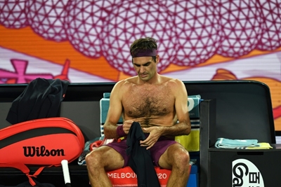 Fired-up Federer storms into Australian Open third round