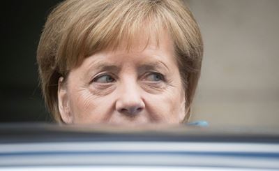 Merkel coalition's fate hangs in balance over elusive migrant deal