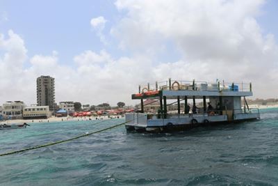 Far from the bombs: Somalis relax on floating restaurant
