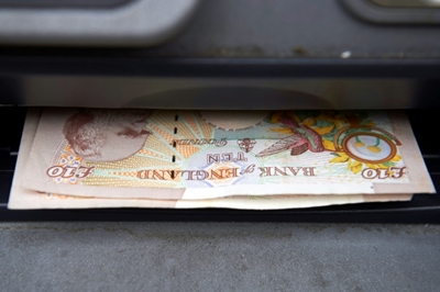 UK clamps down on banks' high overdraft charges