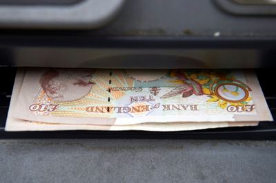 UK clamps down on banks' high overdraft charges