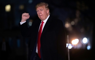 Trump, back from Davos, denounces Senate impeachment trial