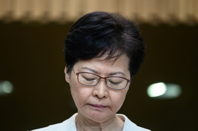 Embattled Hong Kong leader arrives for town hall meeting 