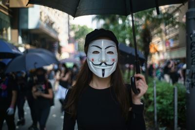 Hong Kong protesters embrace 'V for Vendetta' Guy Fawkes masks