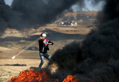 Israel hits Hamas base but Gaza protests fade