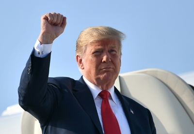 Trump warns countries against doing business with Iran 