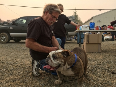 'We'll come back for you': US fires split families, pets