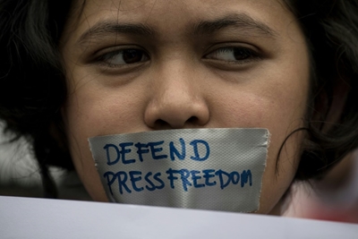 Trump, Russia and China media attacks 'threaten democracy'