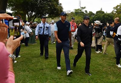 Woods, McIlroy major draws at Japan's star-studded PGA Tour debut