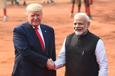 Deadly riots as Trump talks trade, choppers in India