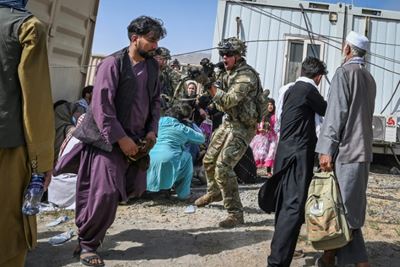 Biden defends US pullout from Afghanistan despite panic in Kabul