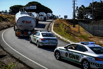 Portuguese police escort fuel trucks as strike begins