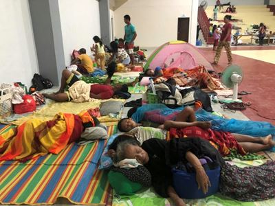 Tens of thousands flee as super typhoon hits the Philippines 
