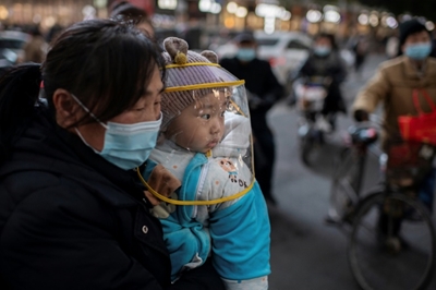 WHO team due in Wuhan as China reports first virus death in months