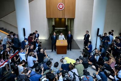 Hong Kong leader calls for dialogue after protesters reject concession
