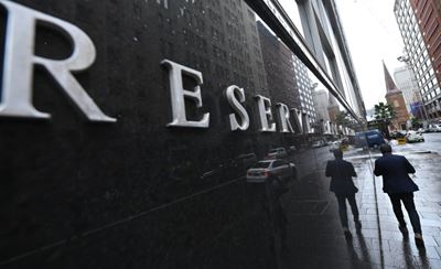 Australia cuts interest rates further