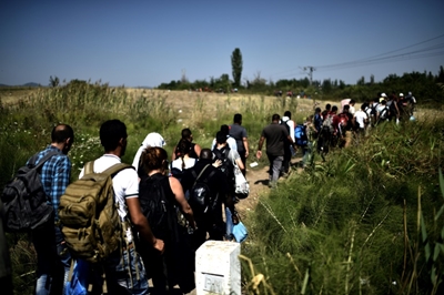 Migrant route to refugee status: an Iraqi family's odyssey 
