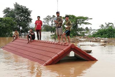 131 missing from dam collapse as 26 bodies recovered