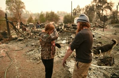 Victims mourned as toll hits 77 in California wildfire
