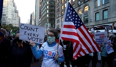 Peaceful protests in New York as tensions rise in Detroit