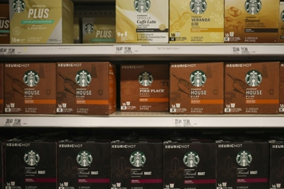 Nestle seals deal to market Starbucks coffee