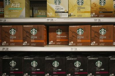 Nestle seals deal to market Starbucks coffee