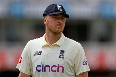 England suspension for Robinson over racist tweets 'over the top': minister