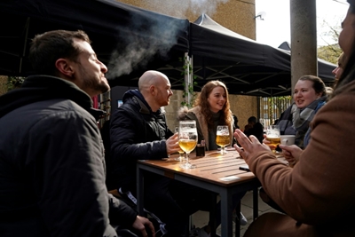 Britain dives back into normal life as India battles new surge