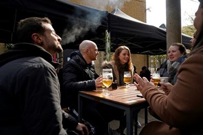 Britain dives back into normal life as India battles new surge