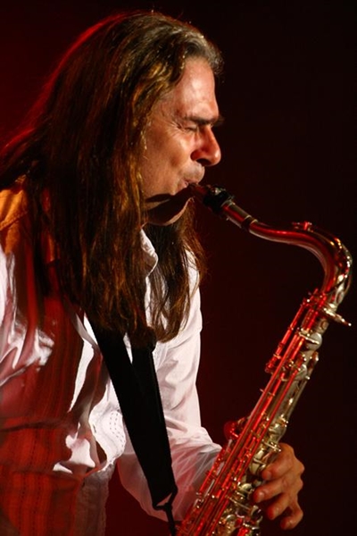 Journey the rise of The Beatles with internationally acclaimed saxophonist