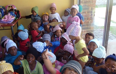 Warm beanies for Plett needy