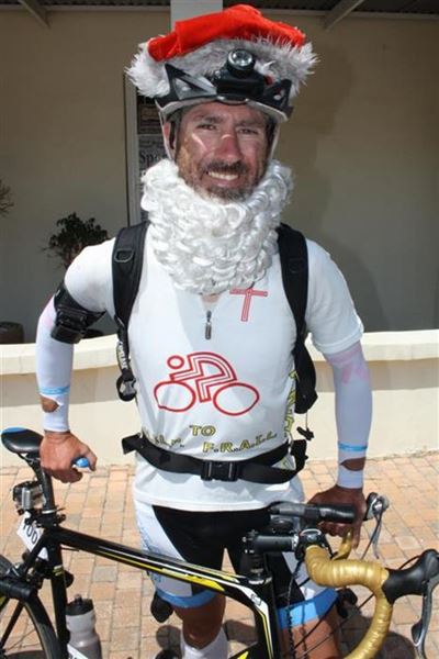 Cyclist dons Santa beard for the elderly