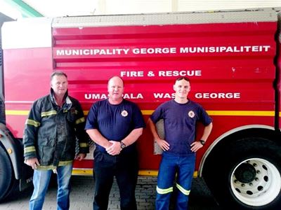 Local firemen fighting fires in Cape Town