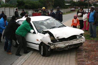 Car overturns twice