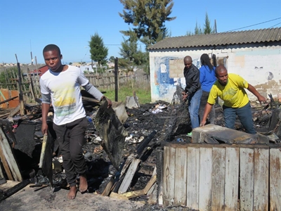 Brother saves baby sister from shack fire