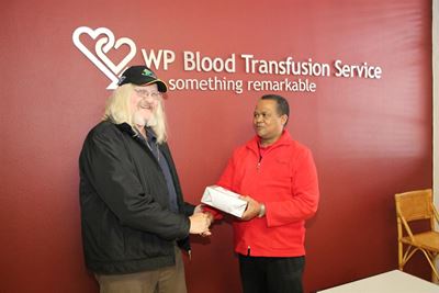 Local (65) donates 300th unit of blood