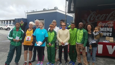 300 runners brave weather for half-marathon
