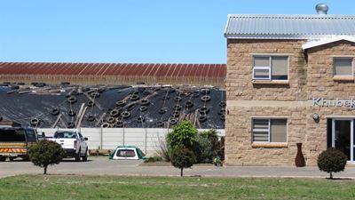 Legal storm over sawdust stockpiles