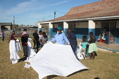 Truckloads of sheets distributed