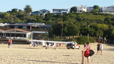 Plane lands on beach due to 'faulty engine'