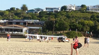 Plane lands on beach due to 'faulty engine'