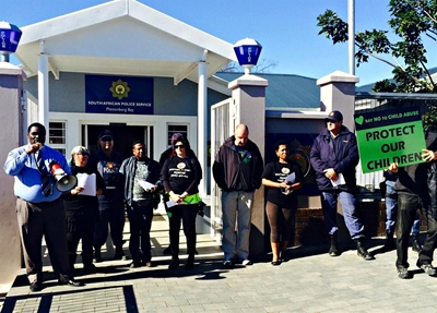 Residents march against child abuse