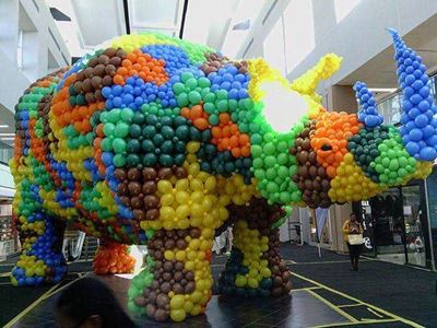 Local helps build giant balloon rhino
